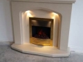 Fireplace showing downlights on